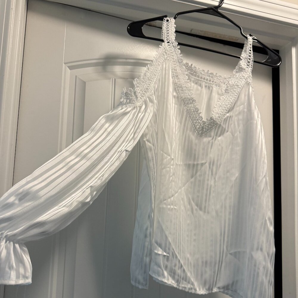 White shoulderless top